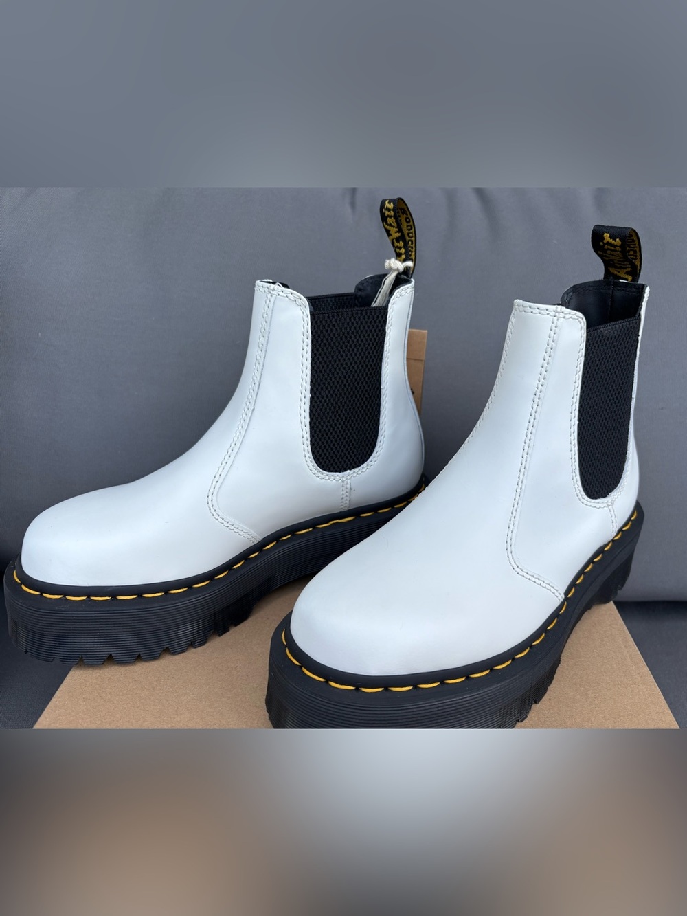 Dr. Martens White Ankle Boots with Black Sole